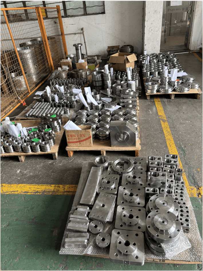 Custom hydraulic cylinder parts manufacturing — clevis, piston, flange, rod end, gland, and hydraulic seals assembled by JW Hydraulic.