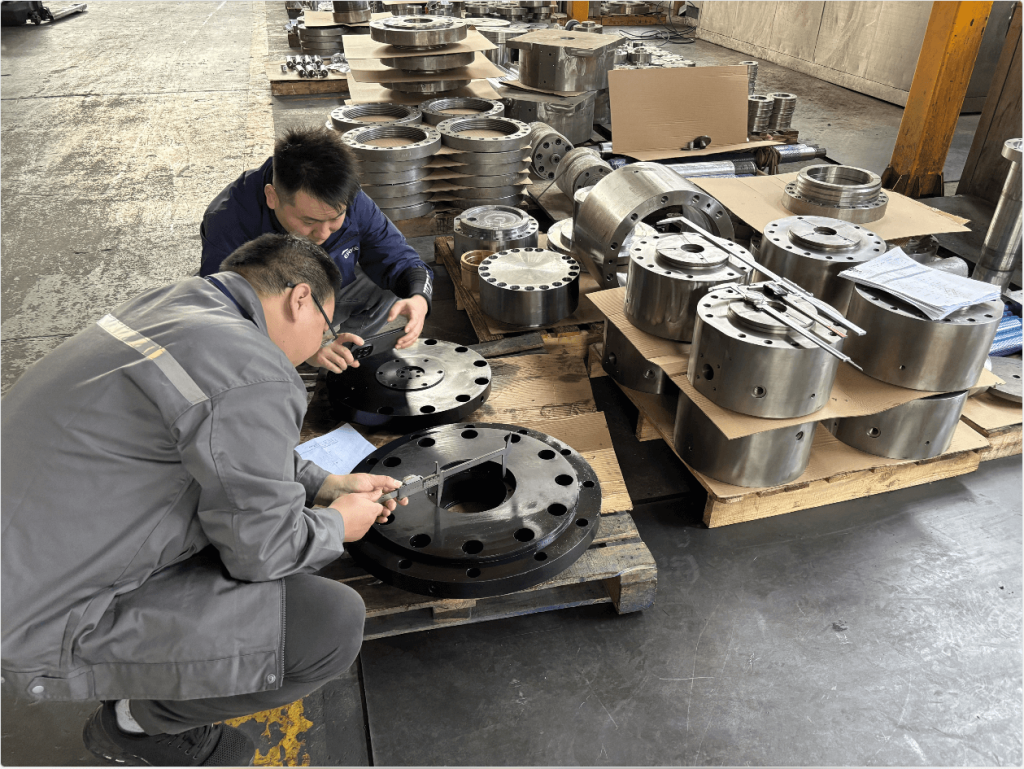 Technician performing precision measurement and quality check on hydraulic cylinder components to guarantee durability and performance.